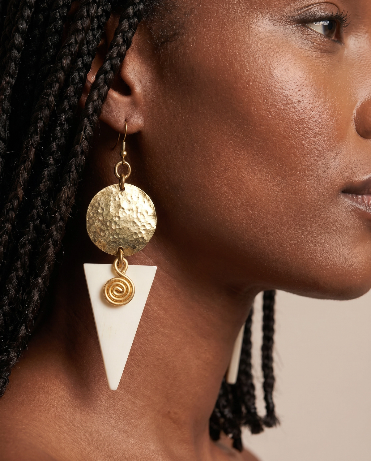Woman wearing Aisha African Earrings, handmade statement earrings