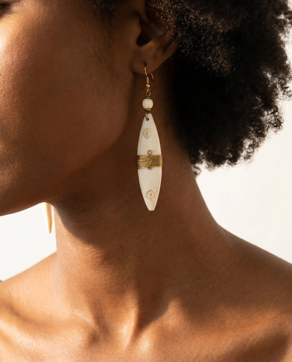 Bahati earring close-up on model
